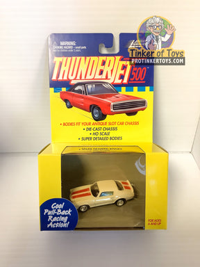 Red and white slot car toy car in open box packaging for Pull Back Thunderjets 393-01
