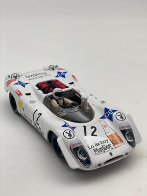 White race car model, Porsche 908/2, with "Lo de hoy Playboy" livery for Fly Car 88248, front view