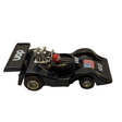Black slot car replica with UOP logo and American flag decal for REH Polistil A.108