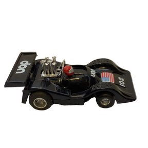 Black slot car replica with UOP logo and American flag decal for REH Polistil A.108