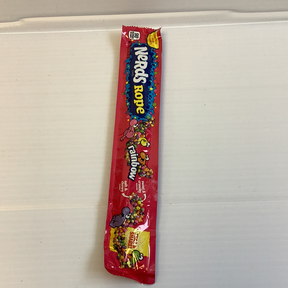 Red and white candy rope wrapper featuring colorful candy shapes for Nassau Candy 5604