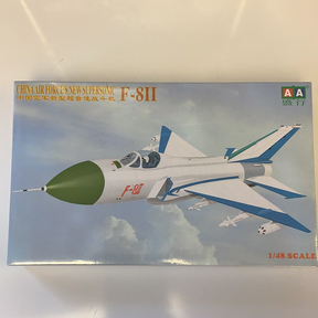 Model kit box art showing a green and white F-8II supersonic jet fighter for IMEX AA0004