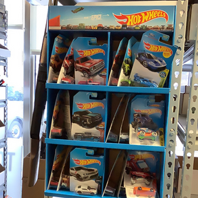 Assorted die-cast toy cars displayed on blue shelving units for UPD FDY58-K910 l Assorted
