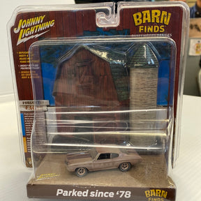 Die-cast model of a 1970 Chevy Chevelle SS parked in a barn setting for Johnny Lightning JLDR004BN