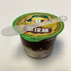Dessert cup with chocolate swirl topping and yellow label for Titan Global Inc 90024