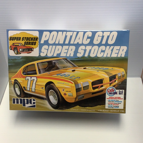 Yellow 1970 Pontiac GTO Super Stocker model kit box art for MPC MPC939