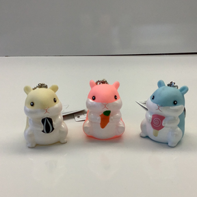 Three cute, stylized hamster charms: yellow, pink, and blue for BC USA 12017, front view