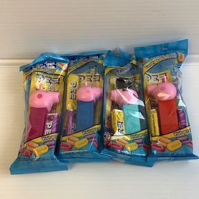 Assortment of Peppa Pig themed candy dispensers in colorful packaging for Nassau Candy 41721