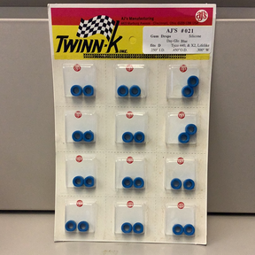 Silicone tire assortment in blue, arranged on a white card with branding for Gum Drops Silicone Day-Glo Blue Tires 021