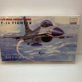 Model kit box art: F-16 fighter jet in flight against a blue sky for Mini Hobby US F-16 Fighter 1/72