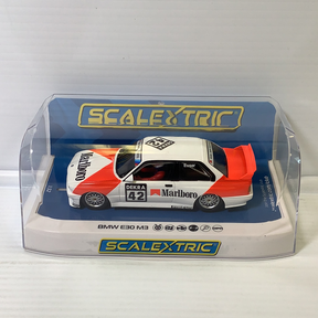 Red and white BMW E30 M3 slot car in clear box for Scalextric C4168