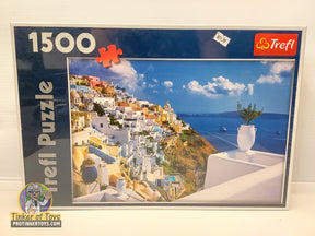 Santorini, Greece puzzle featuring white buildings and blue Aegean Sea for Trefl TRF26119