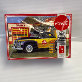 Model kit box art: 1941 Plymouth Coupe at a Coca-Cola gas station for AMT Models AMT1197