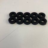 Ten black slot car front tires arranged in two rows for Auto World CP7910, front view