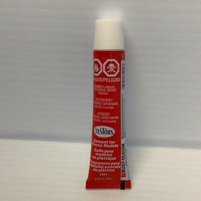 Plastic cement bottle with warning labels and product information for Testors TES3501X