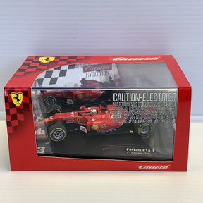 Red and black race car toy in box, Ferrari F14 T "F. Alonso, No. 14" for Carrera Evolution 27496