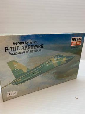 Model kit box art showing a green and yellow F-111E Aardvark jet for Minicraft 14420