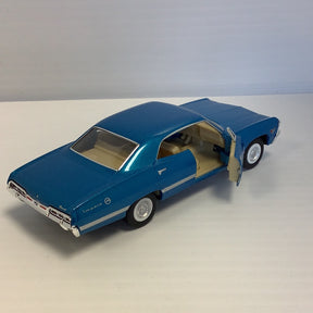 Blue die-cast model of a 1967 Chevrolet Impala with open doors for Kinsmart 5418D