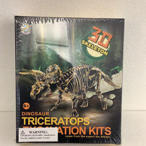 Dinosaur skeleton kit showing a triceratops skeleton in a jungle setting for IMEX Model Company IMX49016