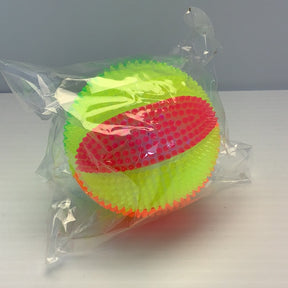 Neon green and pink light-up squeaky beach ball in clear packaging for BVP 84116