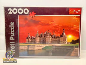 Castle puzzle box featuring Chambord Castle against a vibrant sunset for Trefl TRF27049