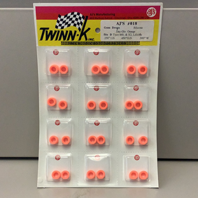 Silicone tire rings in day-glo orange, packaged on a card for Gum Drops Silicone Day-Glo Orange Tires 018