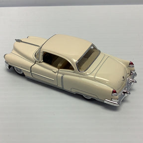Cream-colored 1953 Cadillac coupe toy car viewed from the side for Kinsmart 5339/2D