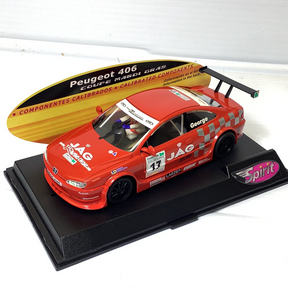 Red slot car, Peugeot 406 Coupe Mardi Gras, on display base for SPIRIT 0501102