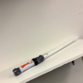 Space saber sword with orange and black hilt, ready for action for Schylling 87644FS