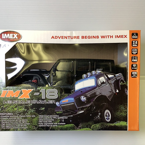 Remote-controlled scale crawler vehicle on display for IMX IMX25015