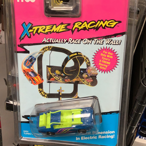 Toy car set packaging showing a blue and yellow race car for Tyco 6494 Turbo Extinguisher