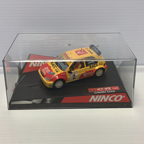 Yellow Citroen Saxo race car model in clear display box for Ninco 50290