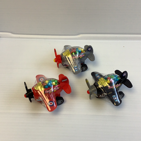 Three toy planes filled with candy, featuring a shark attack theme for Nassau Candy 40021