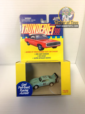 Green slot car in a yellow and blue box for Pull Back Thunderjets 393-01
