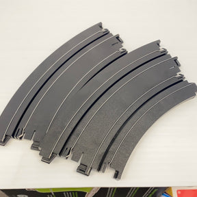 Black curved track pieces for model train layout, 9-inch radius for Auto World H0004