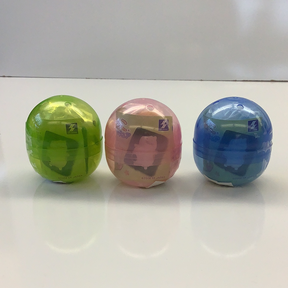 Three translucent, round capsules featuring cat figurines in green, pink, and blue for BC USA 70861