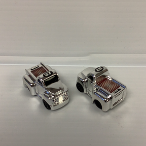 Two silver, miniature police cruiser toys with "37" marked on the front for California Creations 20552