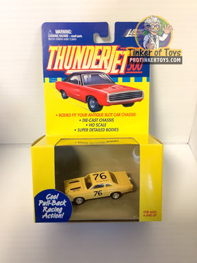 Red and yellow slot car pull-back race cars in packaging for Pull Back Thunderjets 393-01