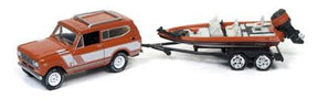 Orange vintage truck towing a small fishing boat trailer for Johnny Lightning JLBT004-B