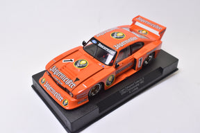 Orange and black 1:32 scale model car, Jaegermeister Capri Zakspeed for Sideways SW29