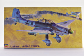 Stuka dive bomber in flight against a yellow sky backdrop for Hasegawa 0953 JT53