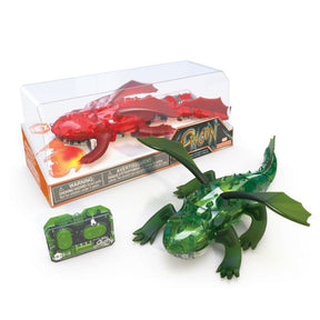Green and red plastic dragon toys in open box packaging for HexBug 409-6847