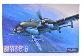 Blue-toned box art featuring a Messerschmitt Bf 110 C/D aircraft in flight for Fujimi 31002