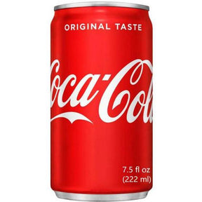 Red aluminum soda can with white "Coca-Cola" script for 06101