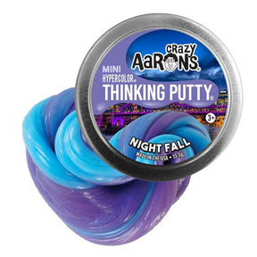 Purple and blue thinking putty in a metal tin for Crazy Aaron's NT003