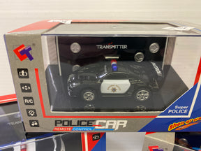 Black remote control police car in its display box for Imex MIC1430