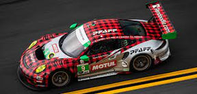 Red and black race car on track, detailed model of a Porsche 911 GT3 R for Scalextric C4252