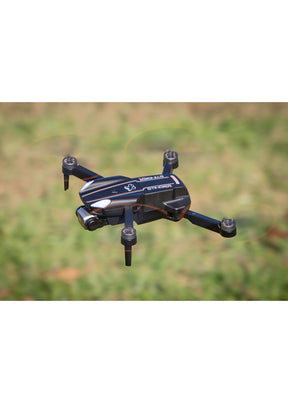 Small quadcopter drone hovering outdoors with a visible camera for Rage R/C RGR4450