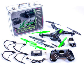 Drone kit with controller, case, and accessories laid out for Rage R/C RGR4400