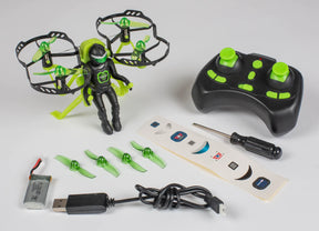 Drone toy with remote controls and accessories laid out on white surface for Rage R/C RGR4422
